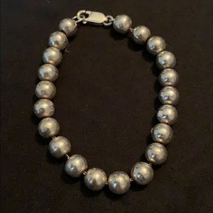 Silver tone beaded bracelet